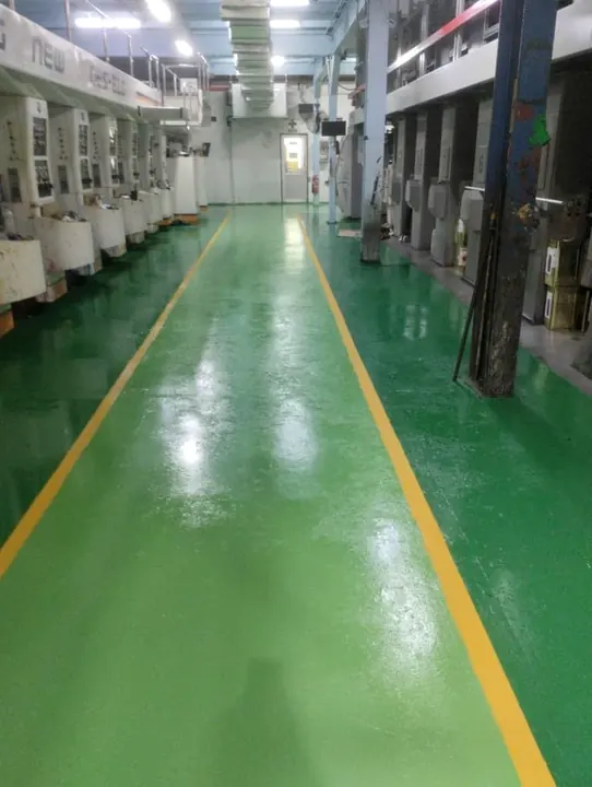 Printing line: coated floor with yellow-marked walkways